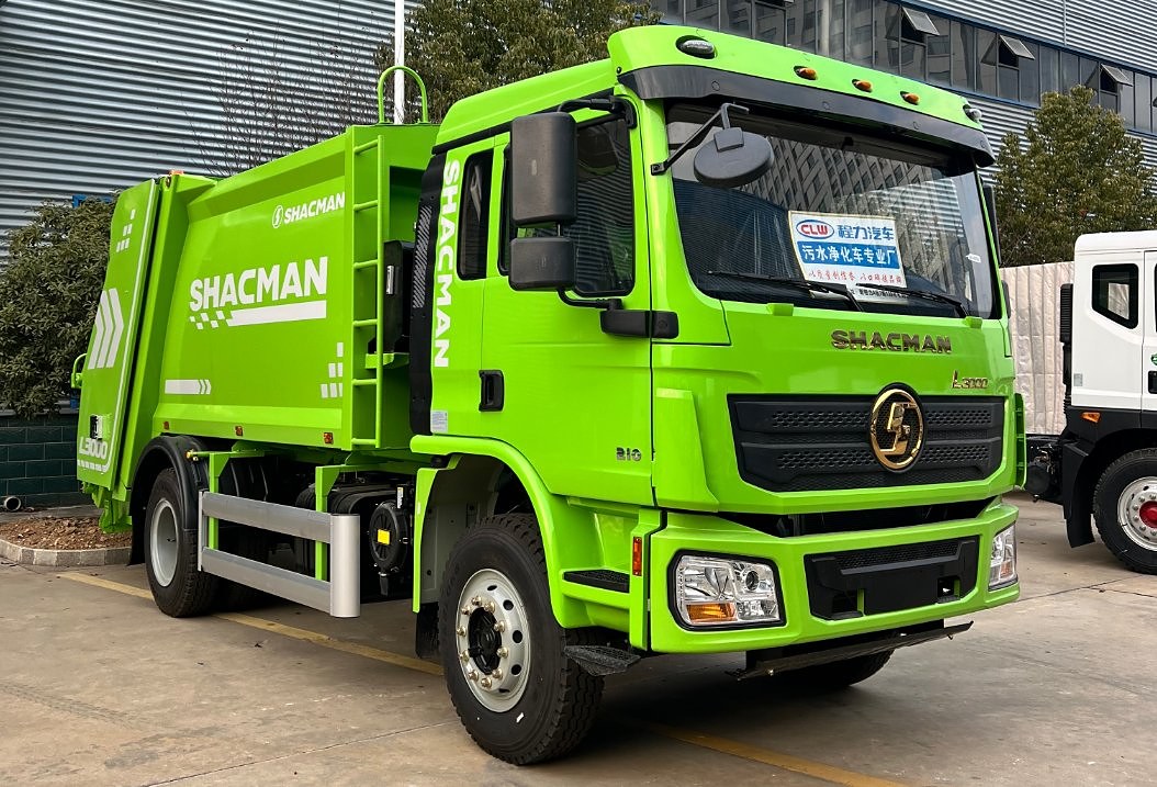SHACMAN 18t Refuse Compactor Truck — Front-right view of cab