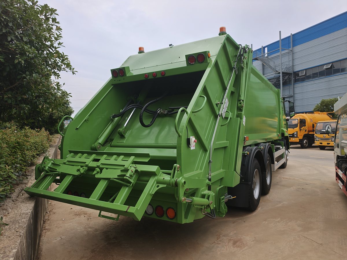 SITRAK 25t Refuse Compactor Truck — Rear-left 45° view